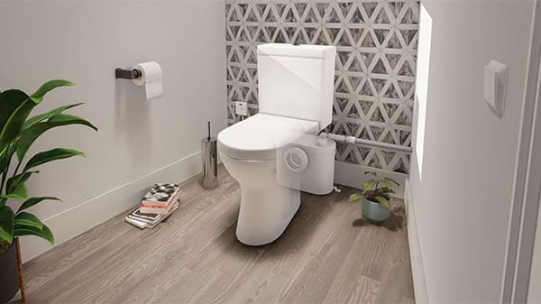 The Saniflo Up toilet installed in a modern garden office