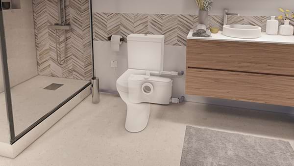 The Sanibest Pro toilet installed in a bathroom in the basement